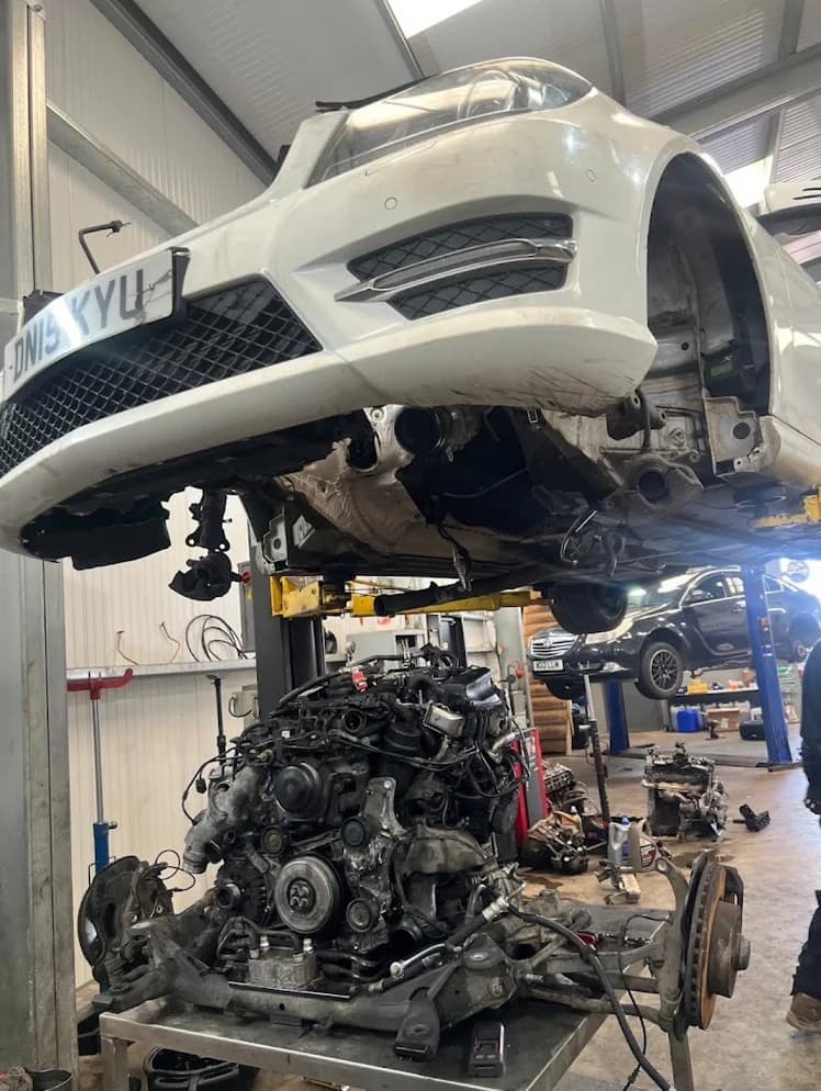 Mechanic working on a car